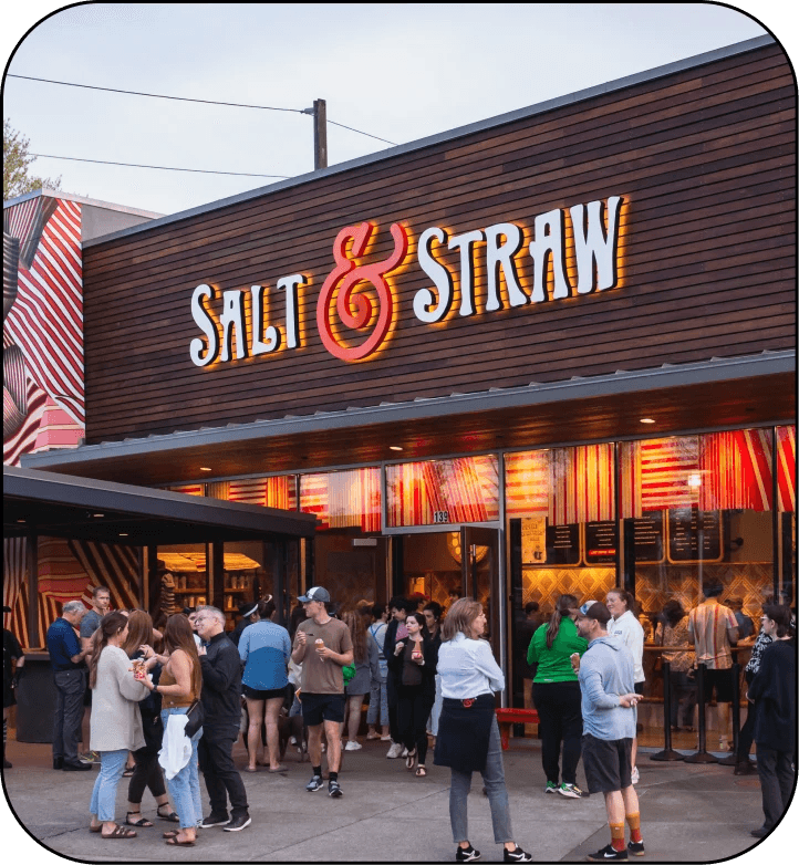 Crowded Salt & Straw storefront at dusk